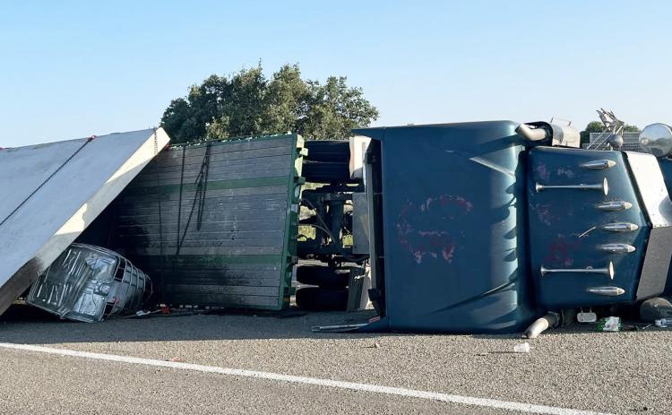On the evening of July 29, 2026, a loaded flatbed tractor-trailer traveling northbound overturned at the merging of US 83S and SH 29E just south of Menard due to excessive speed. No injuries were reported. DPS called in hazmat teams to tend to the unknown liquid substance spilled from a tank on the trailer. It was later determined the substance was non-hazardous concrete sealant. Menard County Sheriff’s Office, MVFD, EMS and State Troopers responded. MCSO photo.
