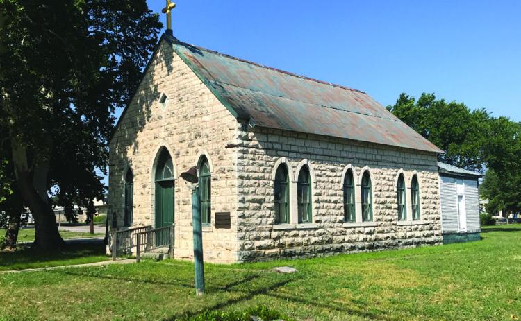 THIS 1899 HISTORICAL BEAUTY has begun renovation as funded by the congregation of Menard's Sacred Heart Catholic Church. Parishioners are hosting a picnic at this original Catholic Church. All are welcome. Father Mark Woodruff, photo.
