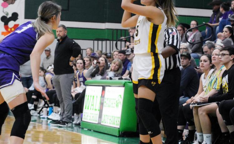 LEFT- Senior Jalyn Montes inbounds the ball during the Lady Jackets loss to Irion County in the first round of playoffs. Jalyn is the only senior the team will lose this year. Photo by Sandy Kothmann.