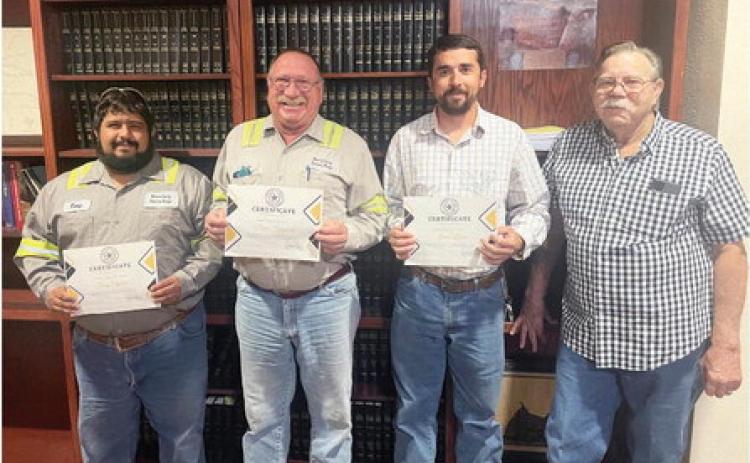 At the September meeting of the Menard County Commissioners Court, the hardworking County Road &amp; Bridge crew was recognized for their service to the county. Pictured above, left to right are crew members Tony Aguilar, Bruce Toeppich, James Davis, and Commissioner Ed Keith. Courtesy photo.