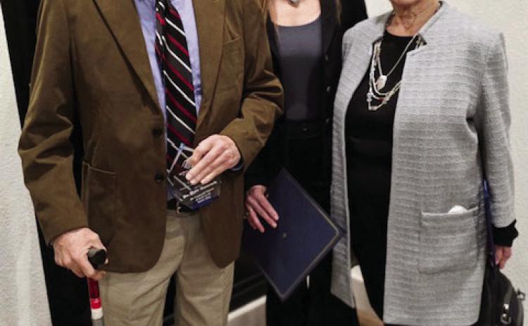 Dr. Dale Hancock, left, was presented with the Boys & Girls Clubs of the Concho Valley's C.A.R.E. Award at an annual meeting last week. Dr. Dale was chosen for the honor, which stands for Committed, Attitude, Respect, Everyday for his 'exceptional support of youth in the Concho Valley.' Pictured with Dr. Dale is Debbie Parker, Menard Unit Director, and Bride Roberts, board member. Courtesy photo.