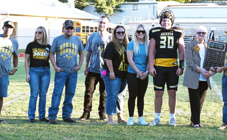 HALL OF FAME CLASS OF 2024: Renee Zimmerman, far right, was inducted into the MHS Hall of Fame last Friday. Renee is currently a practicing Family Nurse Practitioner (FNP) at Frontera Clinic in Menard. Pictured above are family members Daniel Garza, Kayla Wagner, Tyler Wagner, Wesley Wagner, Heather Garza, Mackenzie Wagner, Tate Wagner, Zimmerman, and MHS student council representative Kade Bannowsky. You can read more about Renee's Menard involvement on page 8. Denisse Crisp, photo.