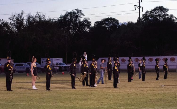 The Menard Yellowjacket Band comprised of 7th through 12th graders marched this year’s competition show, BIONIC, at a recent football game. Nora Davis photo.