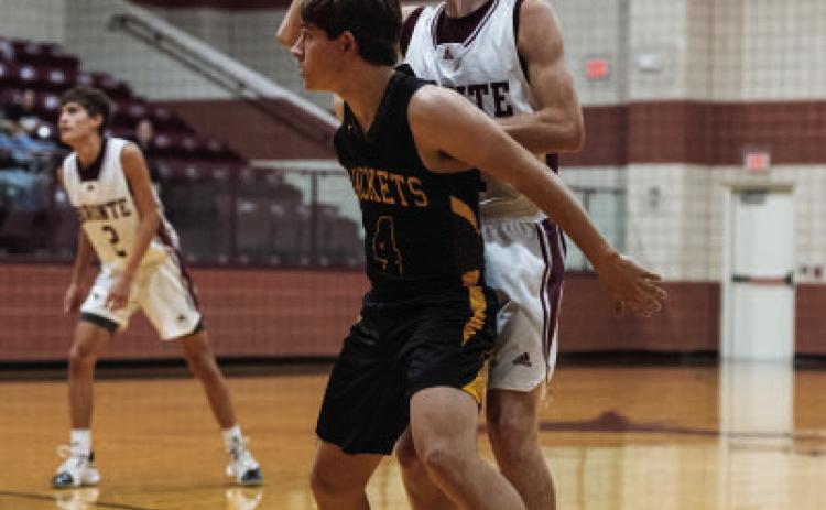 Junior Kade Rayburn blocks out a Bronte Longhorn.