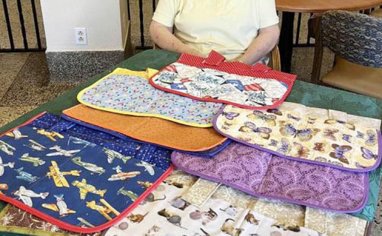 Menard Manor thanks Mrs. Carolyn Keith for making these nice fabric pouches that esidents can use to can hang on their walkers and carry their assorted items while they’re up and about. Thank you, Carolyn! Courtesy photo.