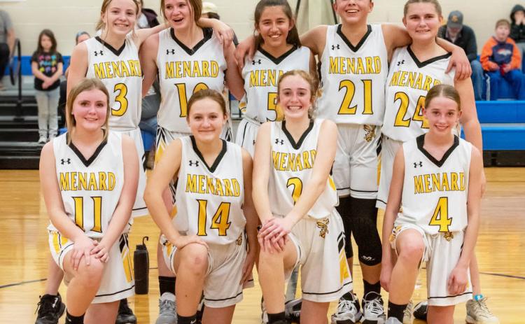 THE FUTURE IS BRIGHT for Lady Jacket basketball, as the Junior High girls proved with their undefeated district season. Pictured front row, left to right: Lainey Thigpen, Kailey Morris, Mackenzie Wright, Taytum Chambless. Back row: Isabelle Devine, Sarah Eggleston, Kinsley Carlile, Perla Pecina, Truely Halley. Nora Davis, photo.