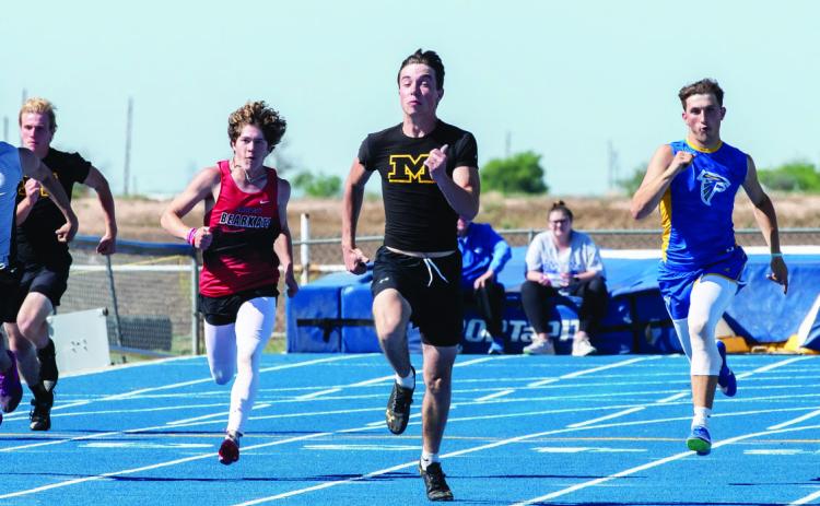 LEFT- Senior Colby Powell tears down the homestretch of his gold medal winning 200m dash at the Area meet. Powell also placed 2nd in the 100m dash, and qualifies for the Regional meet in those events, plus the 4x100m relay. Nora Davis, photo. View additional Area track photos and more by Nora Davis: