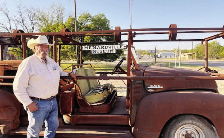 Richard Garcia stands next to his grandfather's sheep shearing rig from the 50s. He happened upon the vehicle on a Facebook post and was able to purchase and return it to Menard County. It now resides at its permanent resting place at Menardville Museum, where others can appreciate its history. Photo courtesy Menard County Historical Commission.