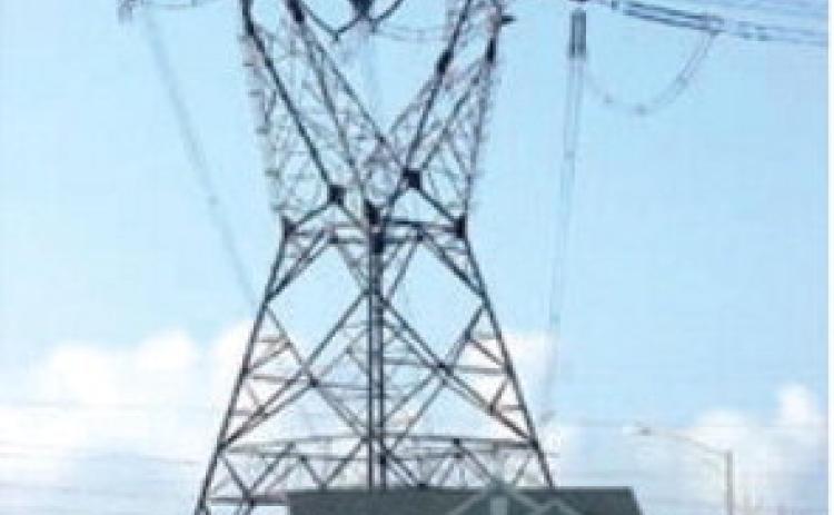 BELOW- This FOSS-contributed image was created to show the size and height comparison of a two-story home next to a tower in the proposed Big Hill to Bell County East transmission line. FOSS (Friends of the San Saba River) photo.