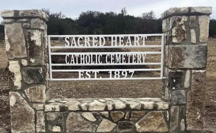 The new sign denoting the old Catholic church cemetery on Cleo Road may be the first permanent identification in the cemetery's 128 years. Courtesy photo.