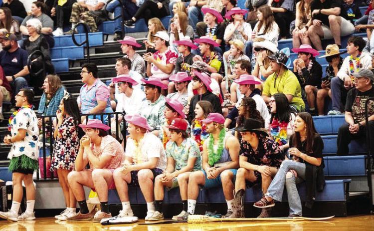 MENARD EXTRACURRICULARS are rarely without a spirited cheering section, as seen last week at the Lady Jackets' final game of the season. Sandy Kothmann, photo.