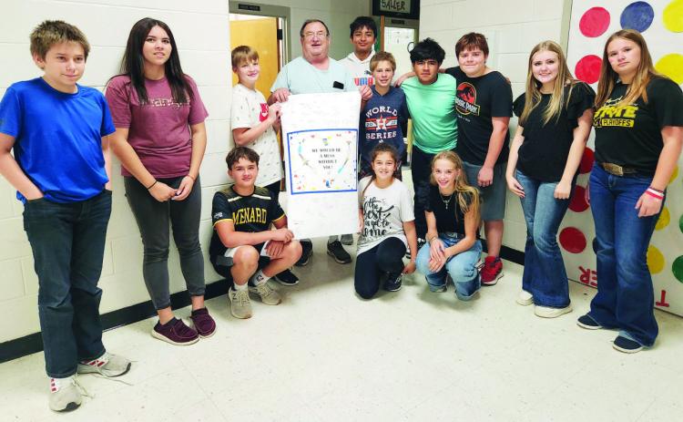 ABOVE- JH students with custodian Terry Estep. LEFT- Elementary students with custodian Josefina Resendiz. BELOW- High School custodian Luz Ugalde with her appreciation offering.
