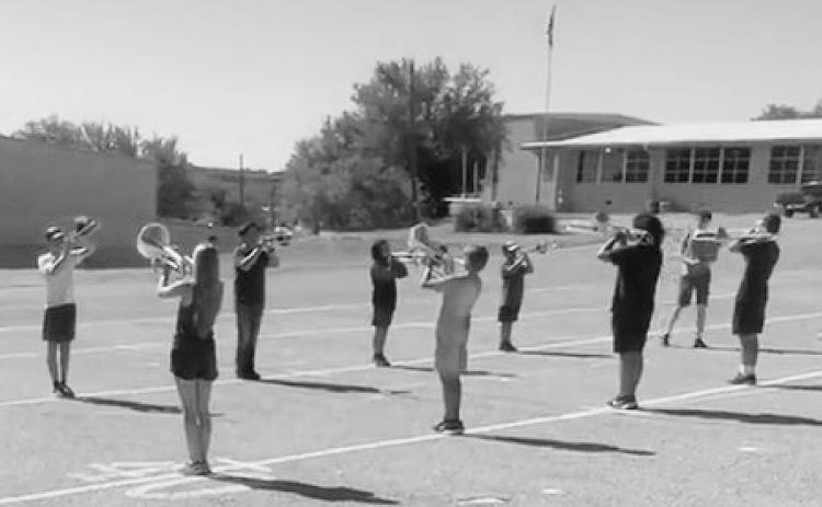 HORNS ARE UP! The Menard Yellowjacket Band has braved the 100 plus temps along with the sports athletes to prepare for the upcoming year. The band is under the direction of Ms. Rebekah Cook in her first year at Menard.