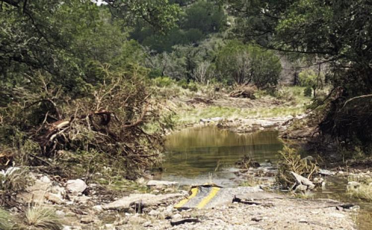 ABOVE- The center stripe of Little Saline Creek crossing on FM 1221 is now in the creek bed. TMN, photo.