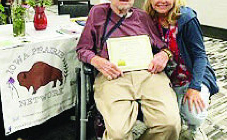 Menard native Dr. Jake Landers, pictured above with daughter Amy Ness, was recognized with the North American Prairie Lifetime Achievement Award. Courtesy Photo.