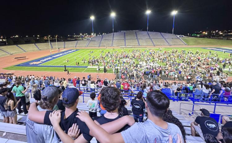 FIELDS OF FAITH- About 40 Menard student athletes attended the annual Fields of Faith gathering in San Angelo last week. Several speakers and a worship band gave thousands of Concho Valley student athletes the opportunity to come together for a night of fellowship and worship underneath the stadium lights. Tyler Wright, photo.