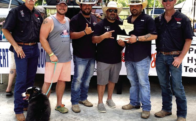 WINNER, WINNER BBQ DINNER- The Los Borrachos team from Menard earned Grand Champion Overall at the June 10 Jim Bowie Day Cook-off. Their placings included a winning Bloody Mary and a second place ribs entry. Complete results can be found listed below. Pictured above is the Los Borrachos accepting their all-around trophy. Left to right: Lee Thornhill, (Chamber Director), Corey Owens, Esai Saiz, Jeremiah Guerrero, Johnny Saiz, Clint Roberson (Chamber Director). TMN photo.