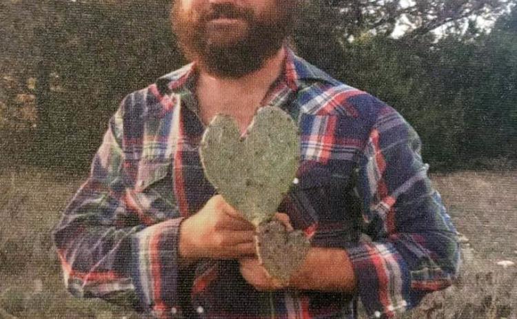 HOUSTON SIMMONS shows his love in a family photo. You can donate in his memory to give back to the local organizations he worked with and cared deeply for.
