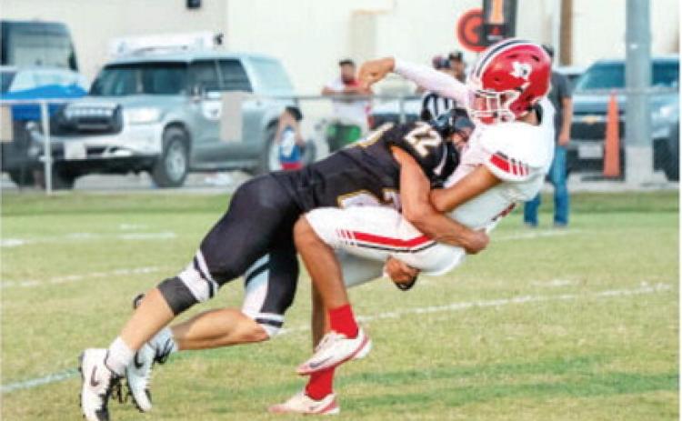 BEAST MODE was sophomore Wesley Compton's setting last Thursday night in the Jackets' 68-6 smattering of the Rocksprings Angoras. Compton had eight tackles including 3.5 tackles for loss and a sack. See more on last week's game on page 9. Menard hosts Bronte this Friday night for Homecoming. Nora Davis, photo.