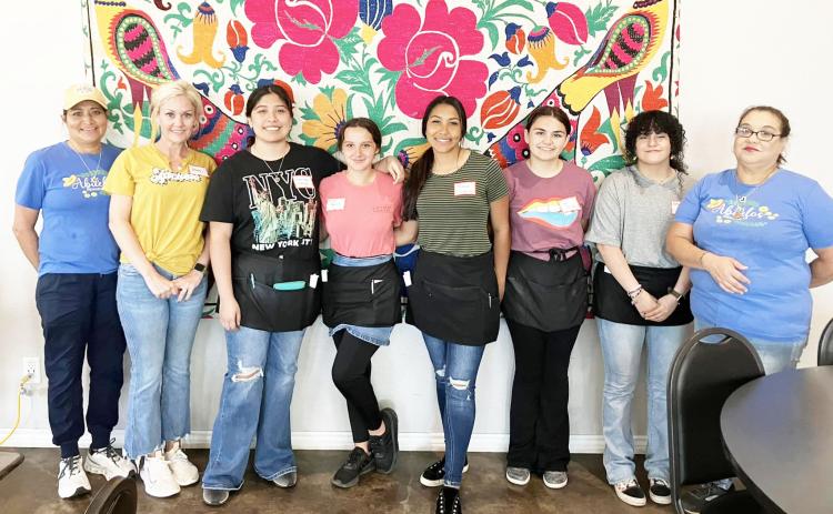 LEARNING THE TRADE- The culinary arts students of MHS had a lesson in being efficient waitstaff last week. Los Abuelo’s Cafe hosted the students and helped with instruction. Pictured left to right- Monica Ojeda (owner, Abuelo’s), Paige Wright (instructor), Marissa Hidalgo, Kathryn Hebert, Nadia Garcia, Jayla Arizola, Bethany Ortega, Victoria Ortega Owens (Abuelo’s staff).