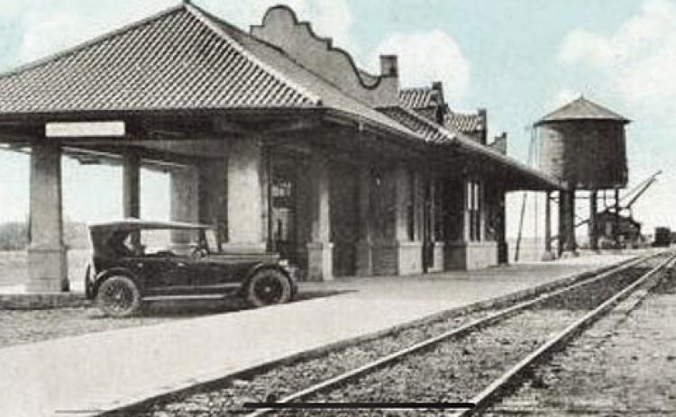 DEPOT TO MUSEUM- Menard's former train depot on Frisco St., pictured in an undated-but-thoughtto- be-1920s photo above, is the current site of the Menardville Museum. The museum is under the operation of Menard County Historical Society (MCHS), who could use your support of their garage sale fundraiser Saturday, October 19, 9-6. Courtesy photo.