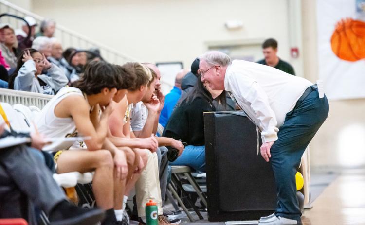 Boys’ head basketball coach Jeff Campbell addresses the
