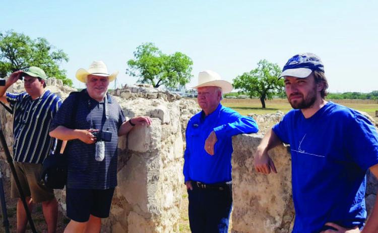 ON THE BIG SCREEN- Award-winning Director Jose Lopez Linares (left center) and Presidio Restoration Corporation president Terrell Kelley (right center) take a break with the film crew on a hot Texas summer day. The crew was in the area to gather footage of the Presidio de San Saba for an upcoming documentary on 'important but lesser-known' Spanish Colonial sites. Courtesy photo.